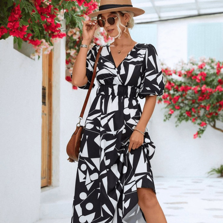 Model wearing a floral spring dress from Amelvia's latest collection

